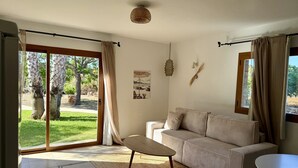 Deluxe Apartment, Garden View | Living area - Agroturismo Sa Marina Ibiza (Santa Eulalia del Rio)