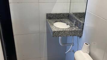 Shower, towels, toilet paper