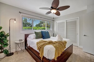 Premium bedding, desk, laptop workspace, iron/ironing board