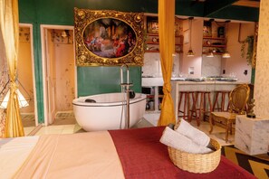 Shower, hair dryer, towels, toilet paper