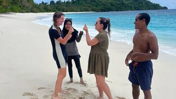 On the beach, white sand, beach shuttle