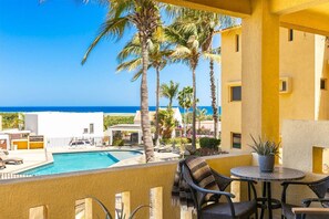 Outdoor dining - Stylish 2-Bedroom Condo with Ocean Views | Walk to Town | Pool & BBQ Area (San Jose Del Cabo)