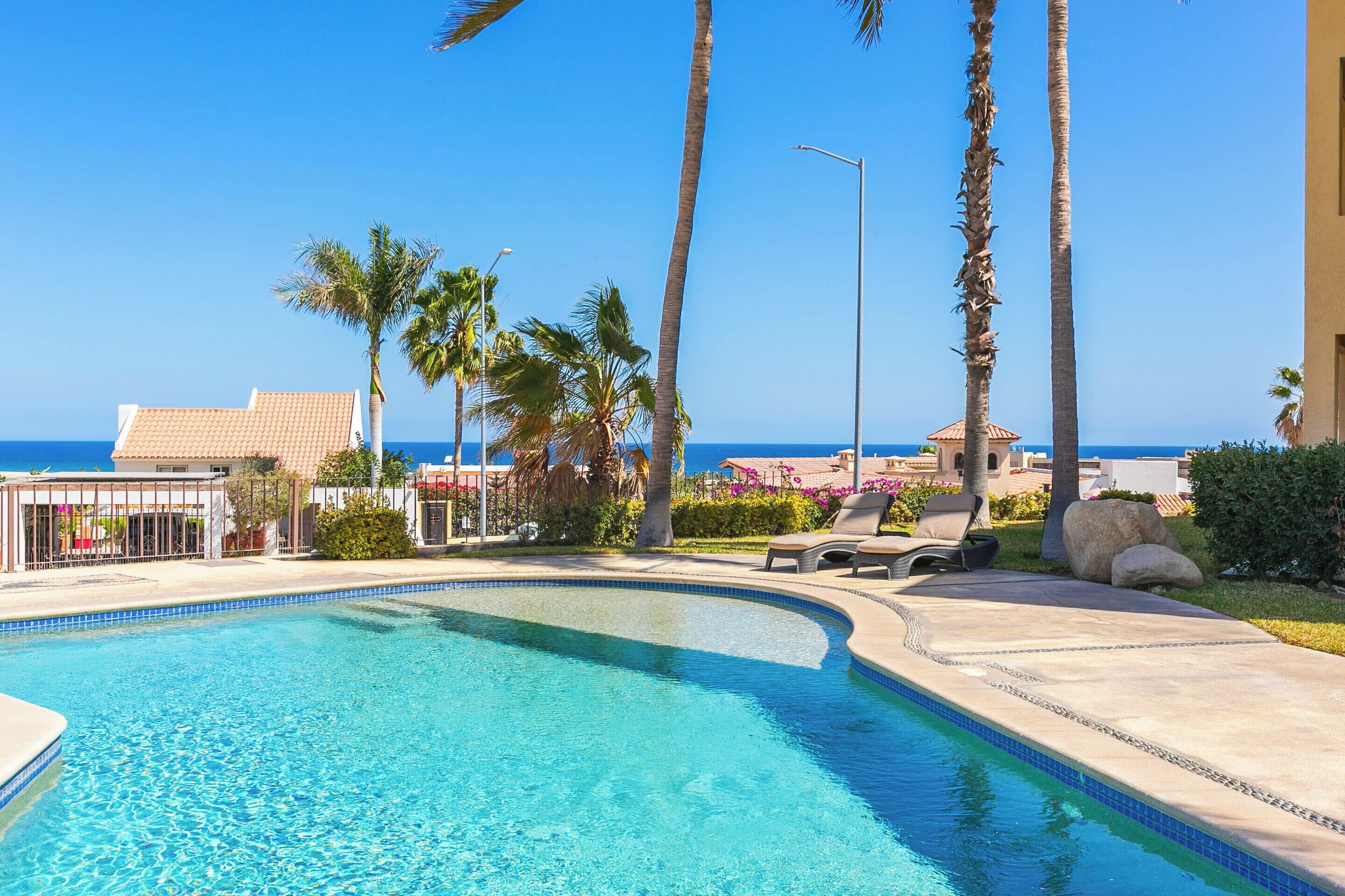 The swimming pool has easy access, making it great for both kids and adults to enjoy