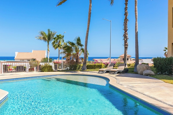 The swimming pool has easy access, making it great for both kids and adults to enjoy