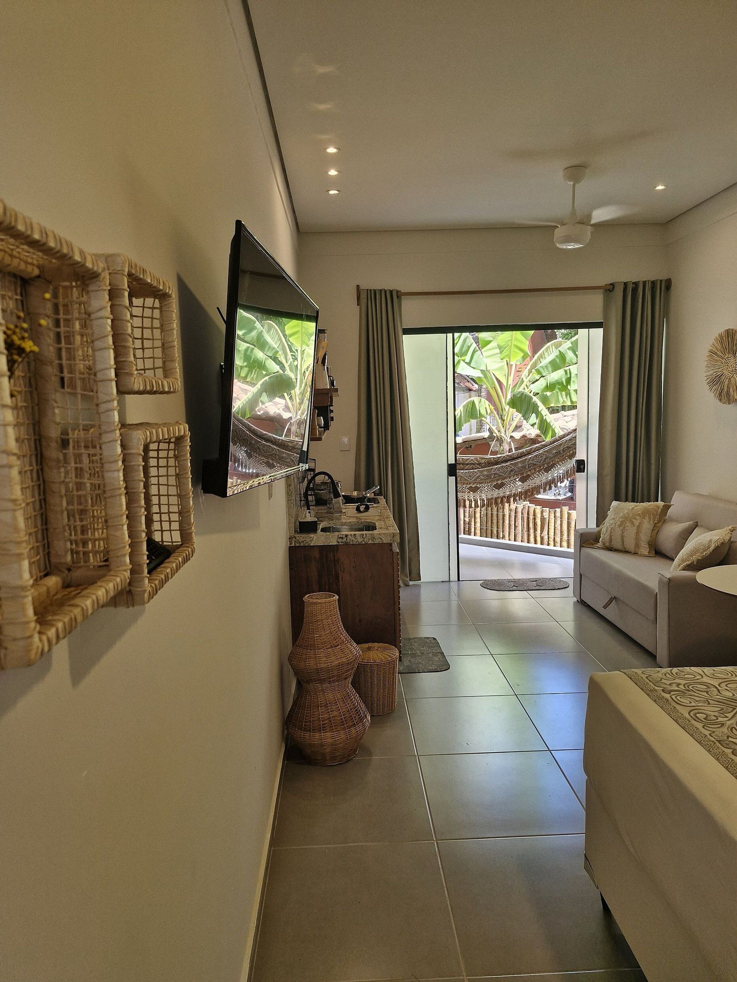 Comfort Apartment | Living area | Flat-screen TV