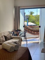 Apartamento conforto | Área de estar | TV de tela plana