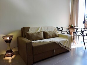 Comfort Apartment | Living area | Flat-screen TV