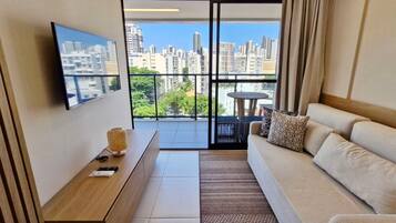 Comfort Apartment | Living area | 40-inch Smart TV with digital channels, Netflix, streaming services