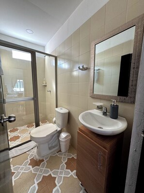 Hair dryer, towels, soap, toilet paper