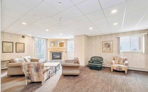 TV, fireplace, books, offices