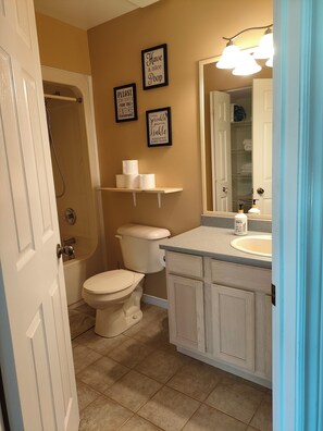 Shower, towels, soap, toilet paper