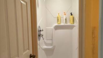 Shower, towels, soap, toilet paper