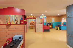 A children's play area with a Beauty Salon, a Diner, and a counter with toys. - U Magic Palace (Eilat)
