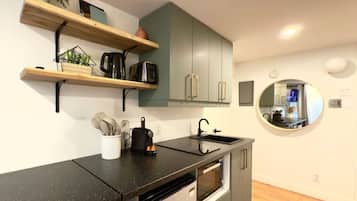 Fridge, microwave, coffee/tea maker, toaster