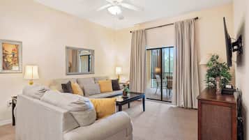 Condo, Multiple Beds, Balcony, Garden View (Caribe Cove Breeze) | Living area | 42-inch flat-screen TV with digital channels