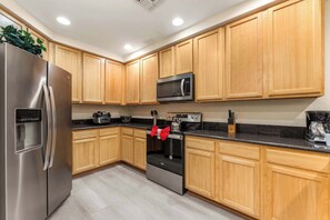 Condo, Multiple Beds, Balcony, Garden View (Caribe Cove Breeze) | Private kitchen | Fridge, microwave, oven, stovetop