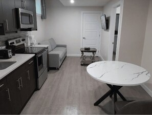 Microwave, oven, stovetop, dishwasher - A cozy one bedroom suite located in the peaceful neighborhood of Evergreen. (Saskatoon)