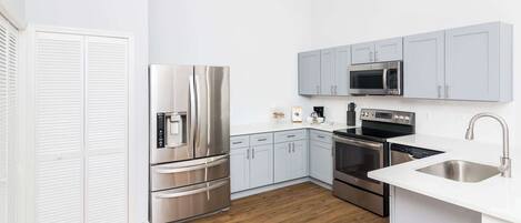Condo, Multiple Beds, Balcony, Garden View (Celebrate at Club Cortile) | Private kitchen