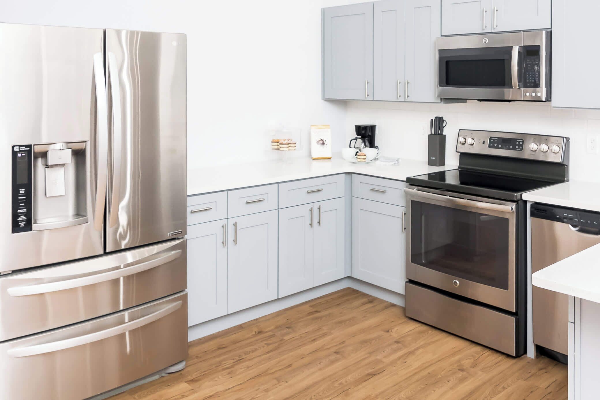 Condo, Multiple Beds, Balcony, Garden View (Celebrate at Club Cortile) | Private kitchen | Fridge, microwave, oven, stovetop