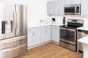 Appart'hôtel, plusieurs lits, balcon, vue jardin (Celebrate at Club Cortile) | Cuisine privée