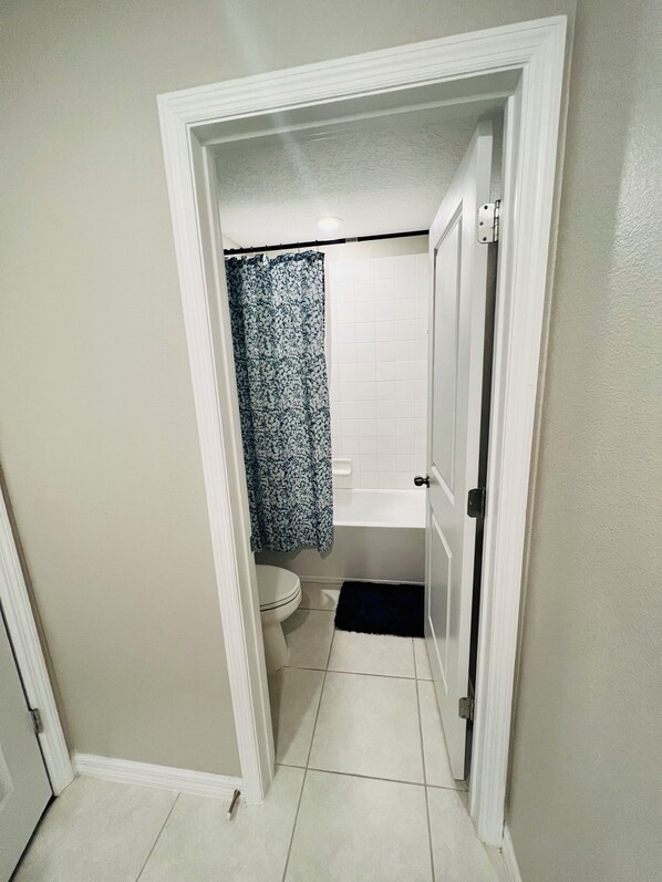 Hair dryer, towels, soap, toilet paper