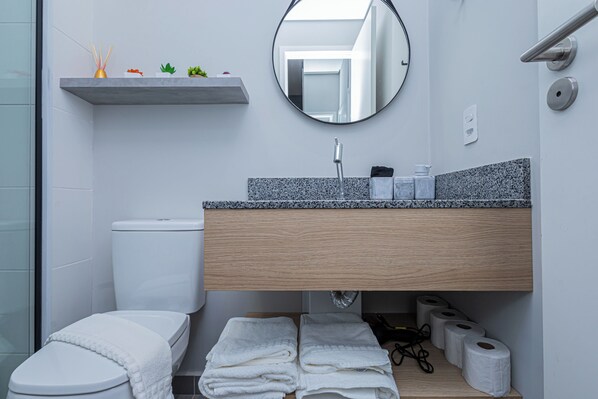 Hair dryer, towels, soap, toilet paper