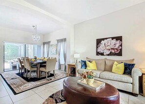 House, Multiple Beds, Pool Access, Garden View (Coco Villa) | Living area | 42-inch flat-screen TV with digital channels - Coco Villa Stay for 10 w/ Resort-style Amenities (Clermont)