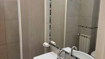 Hair dryer, bidet, towels, soap