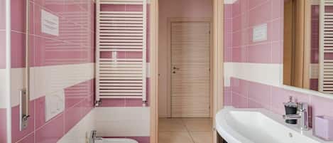 Hair dryer, bidet, towels, soap