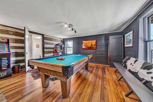 Charming, fully renovated 19th century cabin with spectacular views. 4 BR, 2 BA.