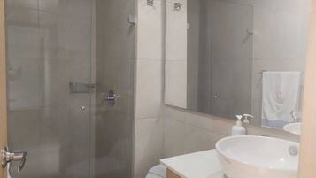 Deluxe Apartment, City View | Bathroom | Towels, soap, toilet paper