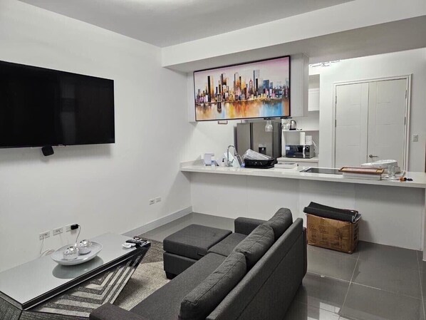 Living area - Comfy Cove. Apt fully air conditioned with Wi-Fi (Kingston)