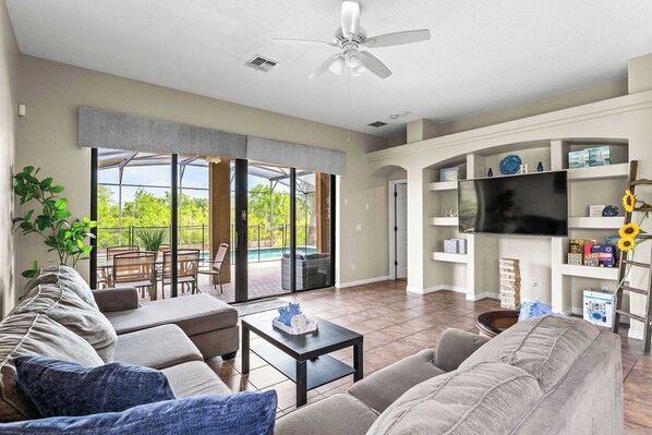 House, Multiple Beds, Pool Access, Pool View (Family Retreat) | Living area | 42-inch flat-screen TV with digital channels