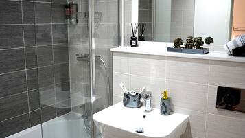 Hair dryer, towels, soap, shampoo