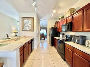 House, Multiple Beds, Pool Access, Garden View (Marcella’s Villa At Acadia Estates) | Private kitchen | Fridge, microwave, oven, stovetop