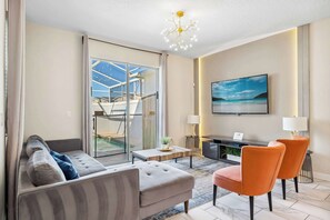 Townhome, Multiple Beds, Pool Access, Pool View (My Happy Place At Championsgate) | Living area | 42-inch flat-screen TV with digital channels