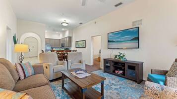 Condo, Multiple Beds, Balcony, Garden View (Peaceful Horizons at Caribe Cove) | Living area | 42-inch flat-screen TV with digital channels