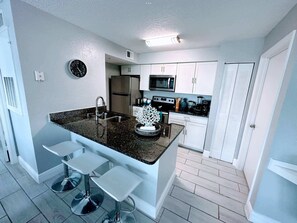 Condo, Multiple Beds, Kitchen (Playing Hooky) | Private kitchen | Microwave, oven, stovetop, dishwasher