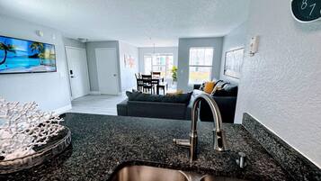 Condo, Multiple Beds, Kitchen (Playing Hooky) | Living area | 42-inch flat-screen TV with digital channels