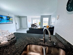 Condo, Multiple Beds, Kitchen (Playing Hooky) | Living area | 42-inch flat-screen TV with digital channels