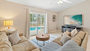 House, Multiple Beds, Patio, Pool View (Poolside Paradise) | Living area | TV - Poolside Paradise Sleeps 6! (Davenport)