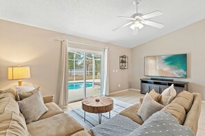 House, Multiple Beds, Patio, Pool View (Poolside Paradise) | Living area | TV - Poolside Paradise Sleeps 6! (Davenport)
