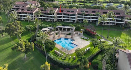 2-bedroom ocean view condo steps from beach, golf, dining, hotels, & shops.