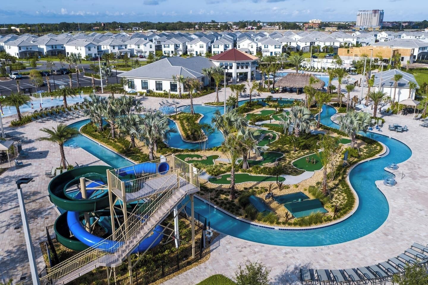 A resort with a water park, a pool, and a golf course.