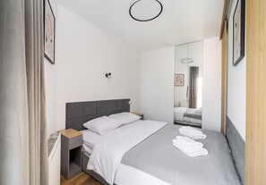 1 habitación, tabla de planchar con plancha, wifi y ropa de cama 