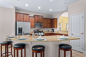 House, Multiple Beds, Pool Access, Pool View (The Magic Hideaway at Solterra) | Private kitchen | Fridge, microwave, oven, stovetop - The Magic Hideaway at Solterra (Davenport)