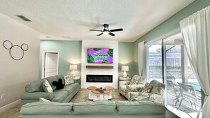 House, Multiple Beds, Pool Access, Pool View (The Magic Hideaway at Solterra) | Living area | 42-inch flat-screen TV with digital channels - The Magic Hideaway at Solterra (Davenport)