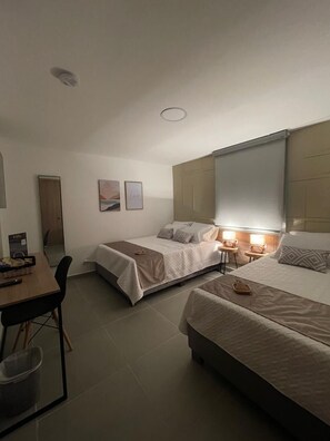 Quadruple Room, 2 Double Beds, Pool View | 1 bedroom, in-room safe, desk, blackout drapes - Casa Gracia Hotel Boutique Cartagena (Cartagena)