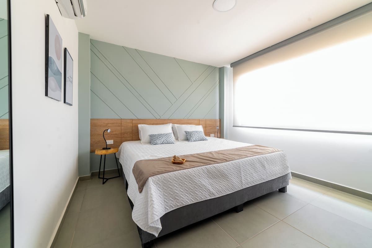 Deluxe Double Room, 1 King Bed, Pool View | 1 bedroom, in-room safe, desk, blackout drapes