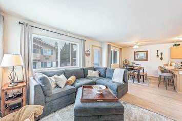 Open concept living room with Smart TV and fireplace
